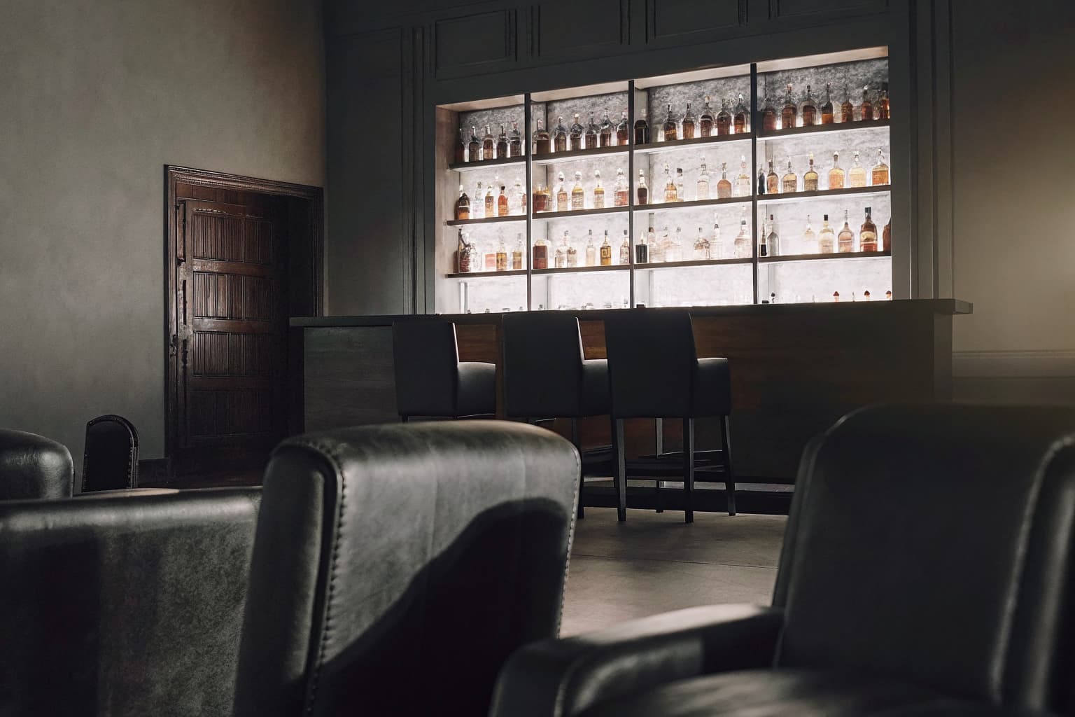 Upscale lounge and bar seating area representing event-driven marketing campaigns