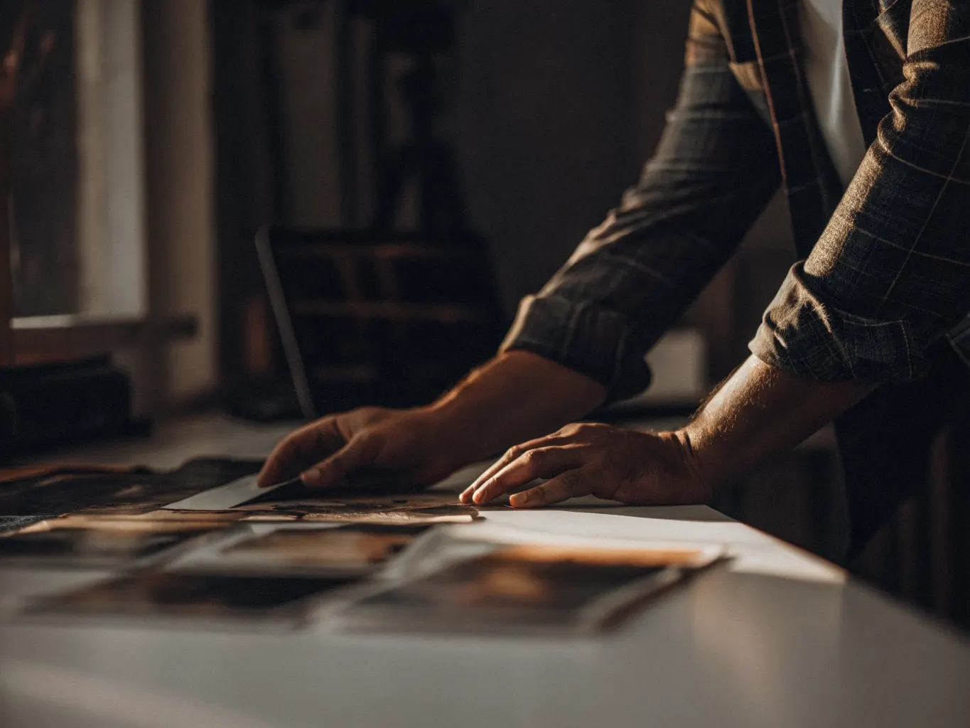 Creative director reviewing premium hotel brand graphic design materials