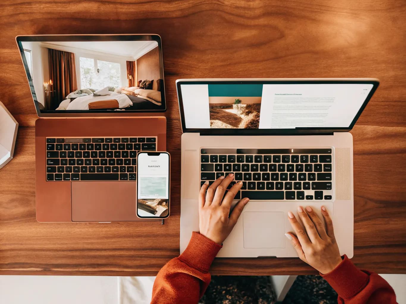 Responsive hotel website design displayed on multiple devices